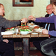 Putin and British prime minister Tony Blair share a vodka toast in 2000.
